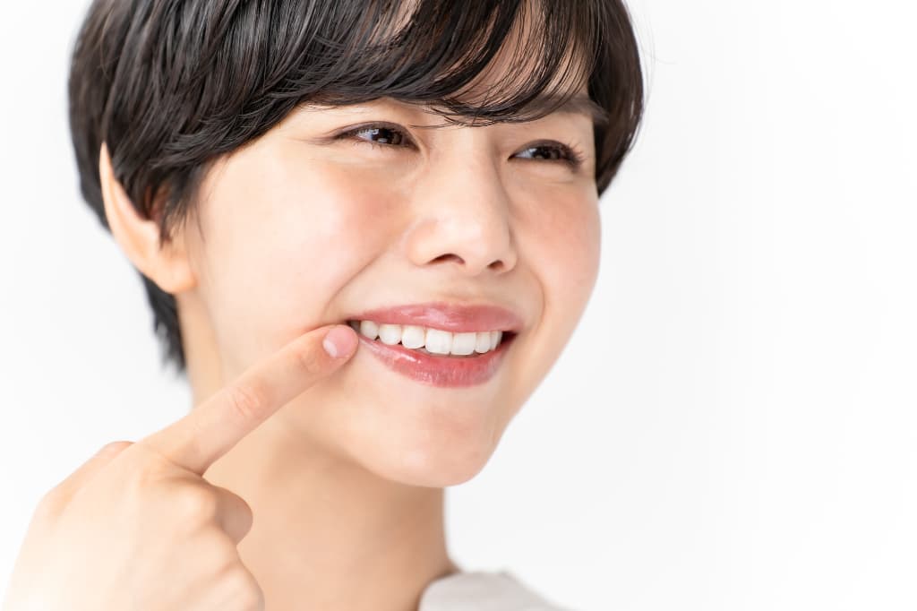 歯周病を予防し口元に自信のある女性